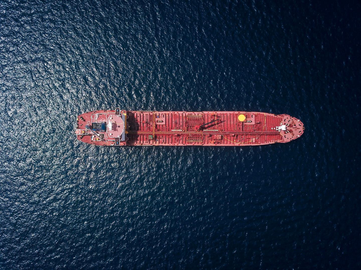 Maritime vessel in the ocean (Photo by Shaah Shahidh on Unsplash)