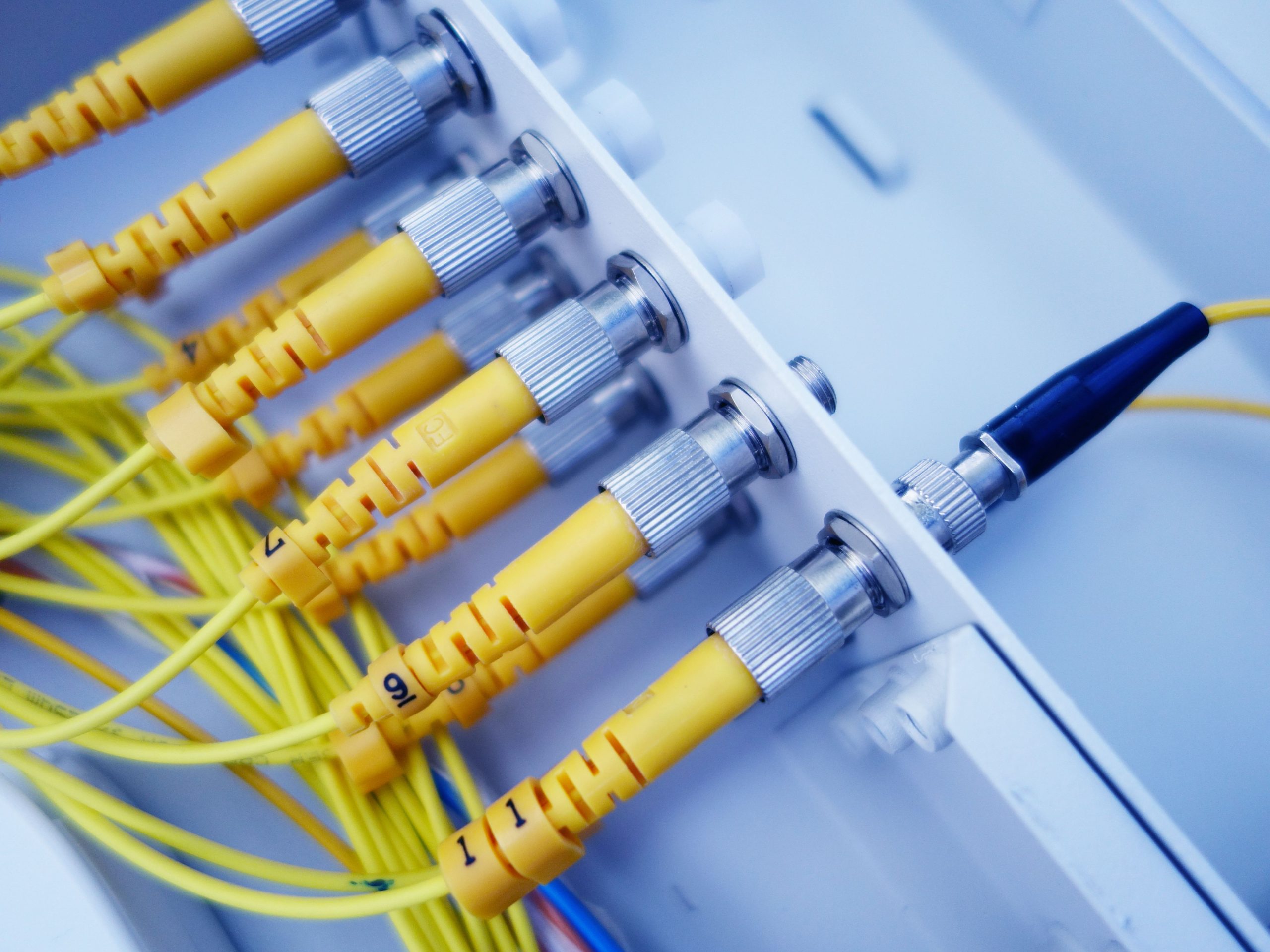 Development of industry-ready kilometre range distributed fibre optic thermo-hygrometer sensors